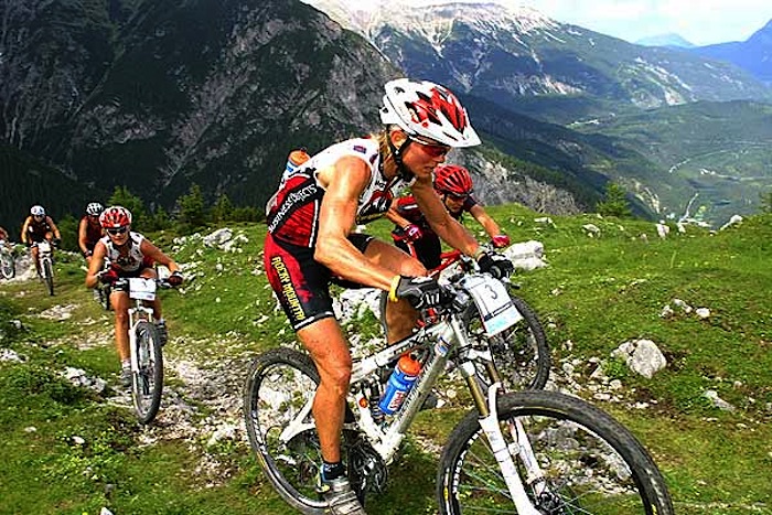 Lesley Tomlinson climbing during the Trans Alp Challenge