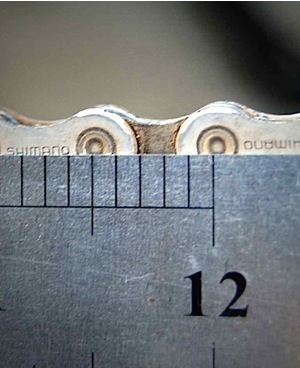 Check bicycle chain with ruler