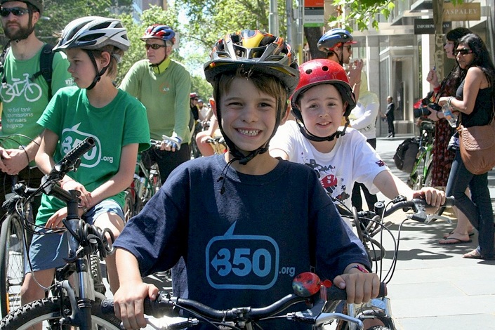 Kids and family on bikes at protest