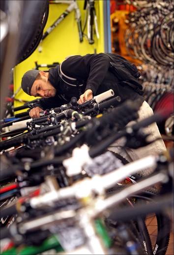 local bike shop staff learning new technology