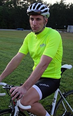 Neon cycling jersey and helmet