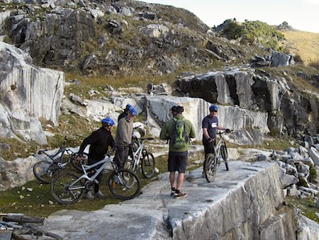 mountain bike adventure on rocky outcrop