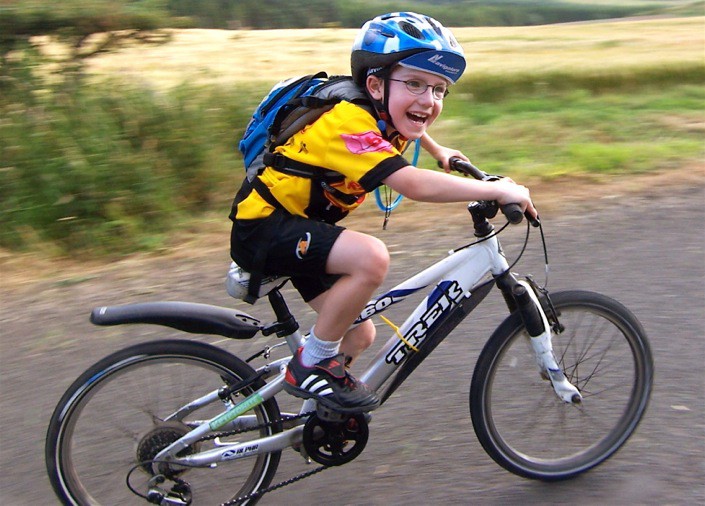 boy riding Trek mountain bike