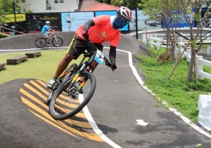 mountain biker taking a berm at Peppermint Bike Park