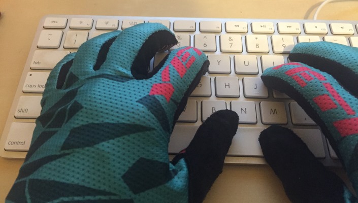 BikeRoar writer Jayne Rutter types in her Yeti gloves.