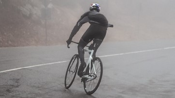 Cycling in the rain with a waterproof jacket. photo: assos.com