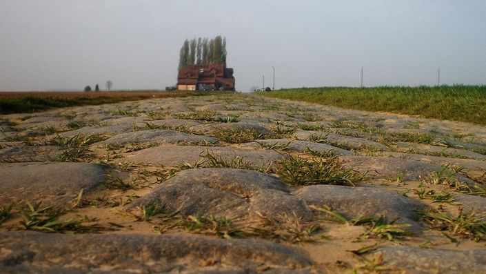 The cobblestones of Paris-Roubaix at Carrefour de l'Arbre / Pavé de Luchin