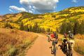 Autumn mountain biking on cement creek road by rob strickland